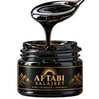 Pure Aftabi Salajeet Himalayan Shilajit resin dripping from spoon into jar - 100% natural, lab-tested shilajit from Pakistan